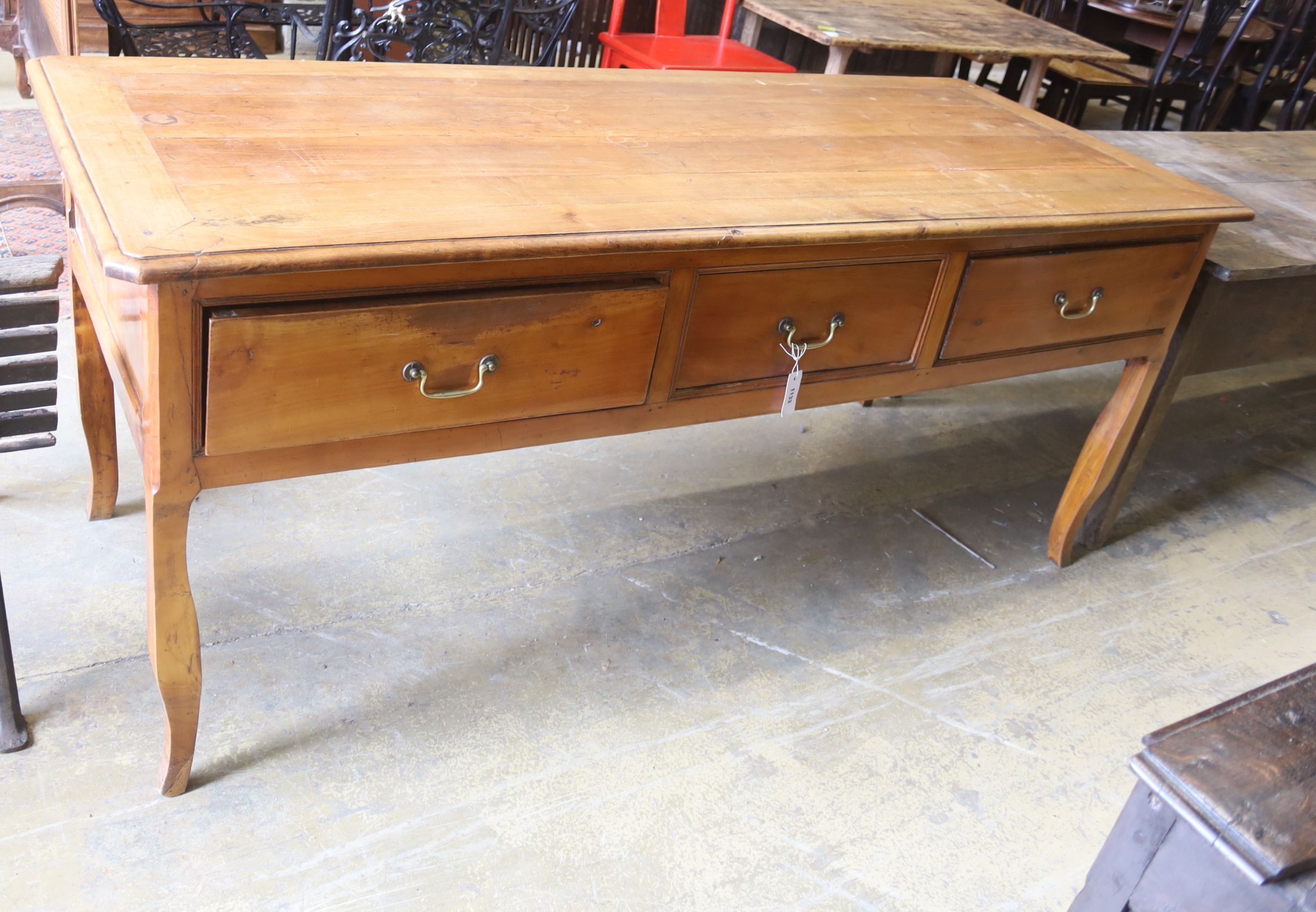 A 19th century French cherry wood three drawer hunt table, width 200cm, depth 80cm, height 84cm
